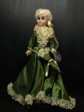 Vintage Vinyl Doll with Green Satin Dress